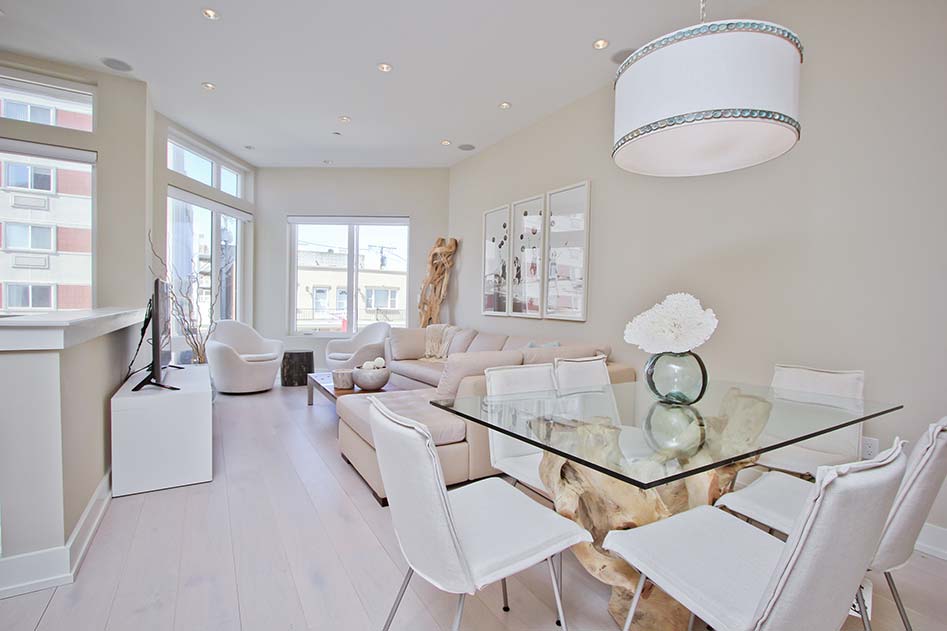 a bright airy dining room with clean white decorations.