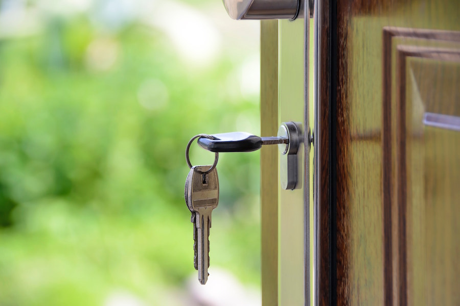 Key in door when renting or buying a home