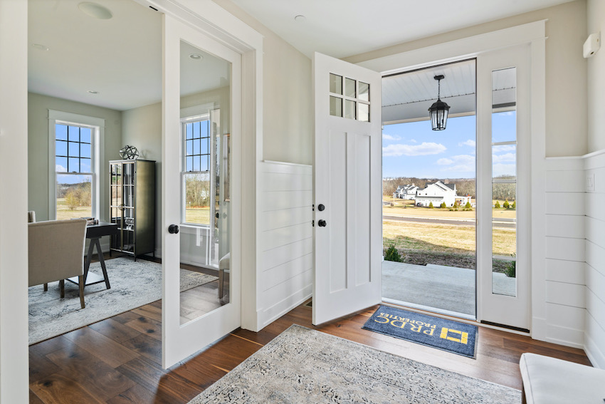 looking out the door of a julius farm home